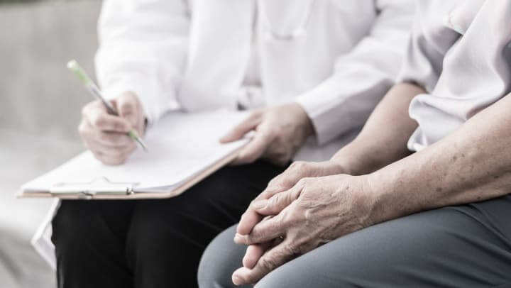 Patient Discussing Health With Doctor