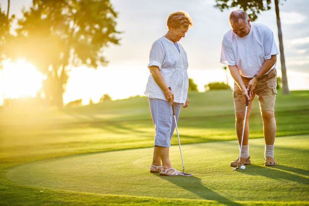 couple enjoying golf