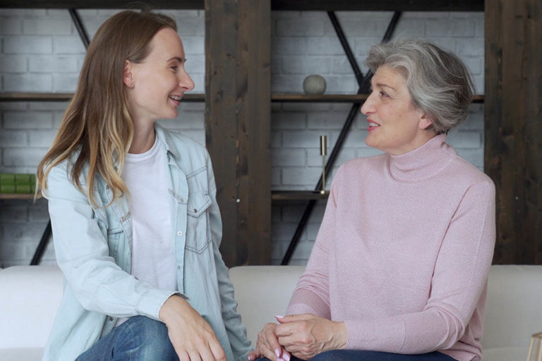 5 Signs Your Parent Needs Memory Care child and parent discussing memory care