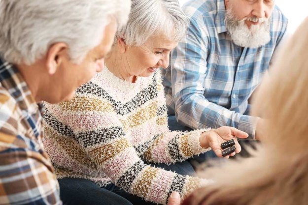 Happy senior people spending time together in nursing home Happy senior people spending time together in nursing home