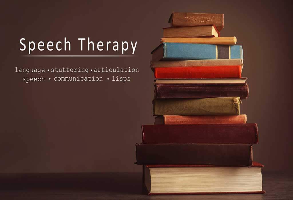 Pile of books on table and dark background