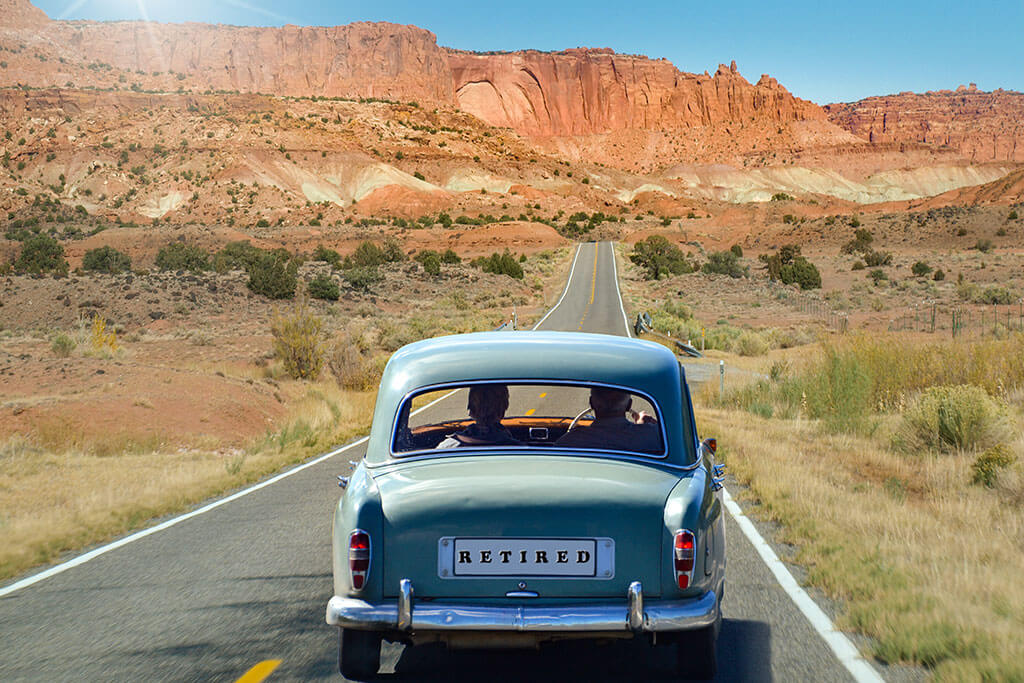 Oldtimer with old couple driving in retirement Oldtimer with old couple driving in retirement