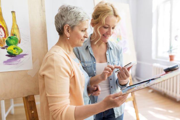artists with smartphone painting at art school The Complete Senior Living Options Offered In Portage, IN