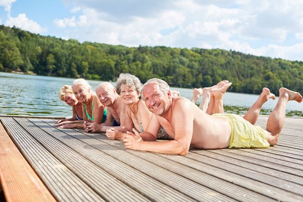 Retired seniors relax at the lake