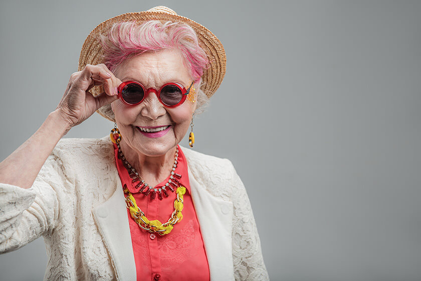 Funny senior lady looking at camera