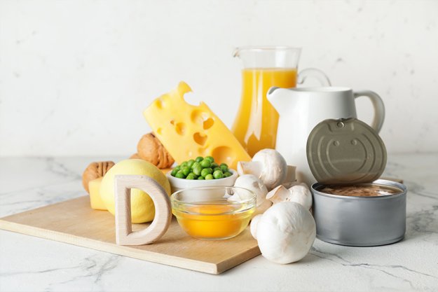 Letter D and different healthy products on light background Letter D and different healthy products on light background