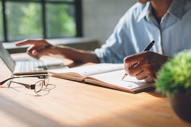 Image of businessman working at work table Image of businessman working at work table