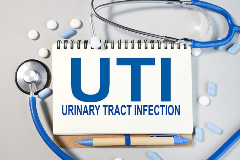 UTI – Urinary Tract Infection Written On White Paper UTI - Urinary Tract Infection Written On White Paper