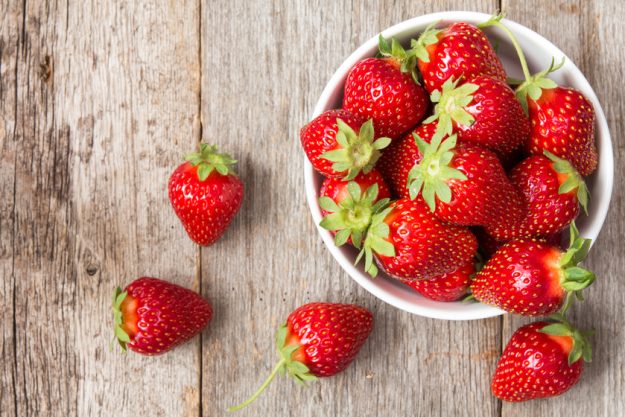 Red strawberry in a bowl