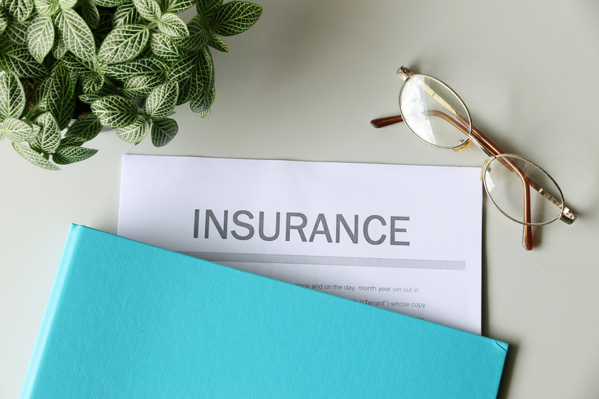 Insurance paper on the desk Insurance paper on the desk