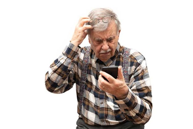 Old grandfather retired with smartphone in trouble with new technology Old grandfather retired with smartphone in trouble with new technology