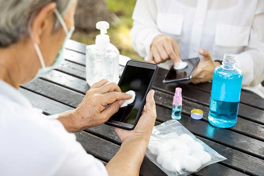 Cleaning mobile phone to prevent Covid-19 infection