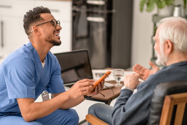 Volunteer enjoying his communication with an aged person Do You Need Respite Care During Special Occasions?