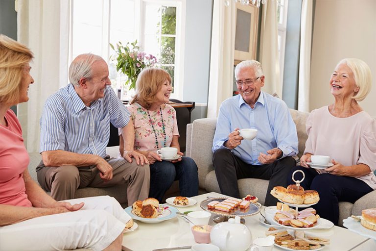 Group Of Senior Friends Enjoying Afternoon Tea