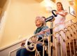 Nurse using machine for climbing to the stairs