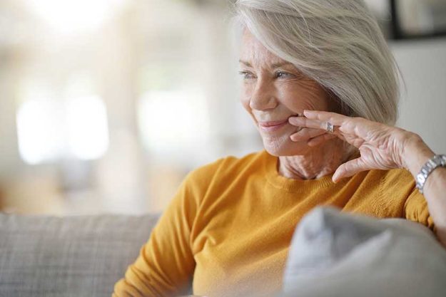 Beautiful senior woman relaxing at home