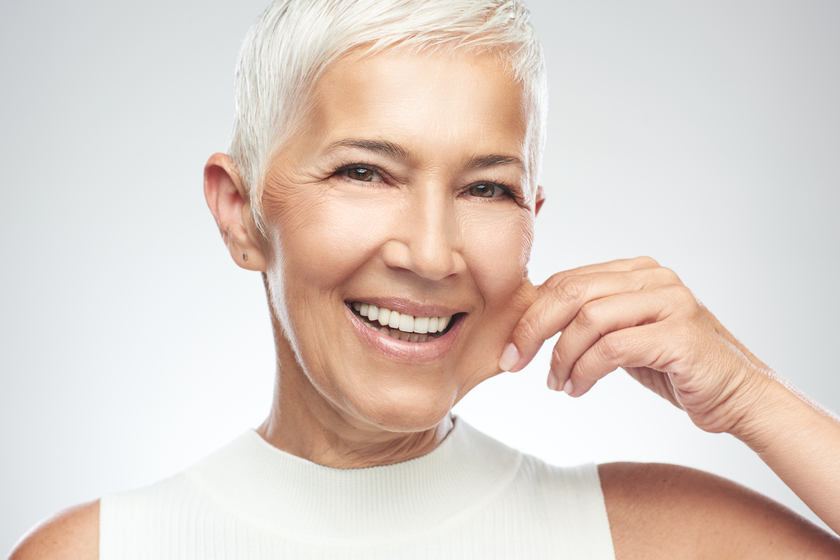 Gorgeous smiling Caucasian senior woman with short gray hair pin Maintaining Healthy Skin While Aging At Independent Senior Apartments Near Washington, PA