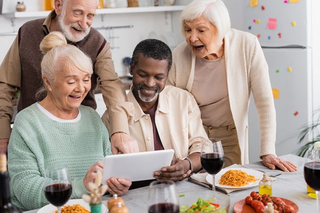 Retired Multicultural People Looking Digital Tablet Happy Senior Friends Tasty