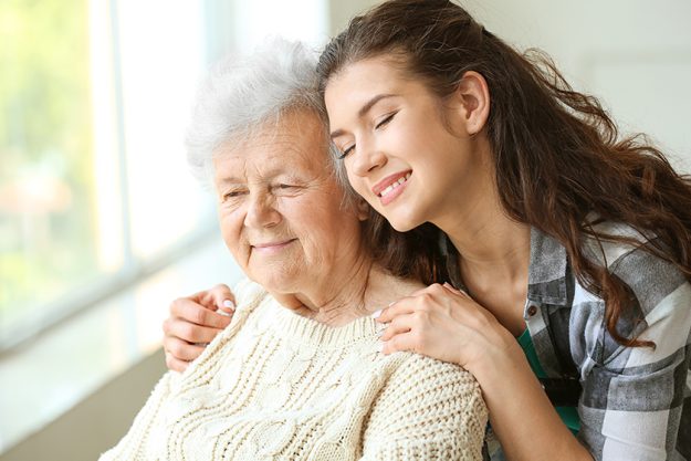 Senior woman with her granddaughter in nursing home
