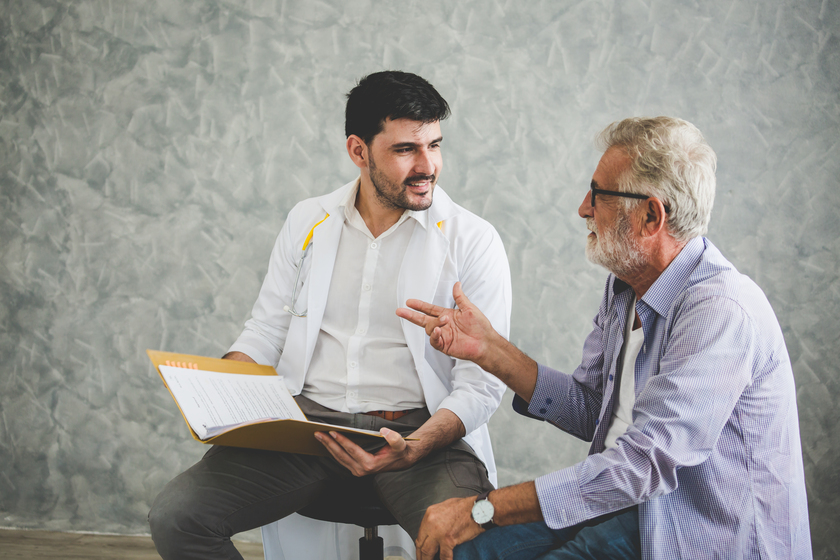 Psychologist doctor discussing with patient How Speech Therapy Helps Seniors After A Stroke