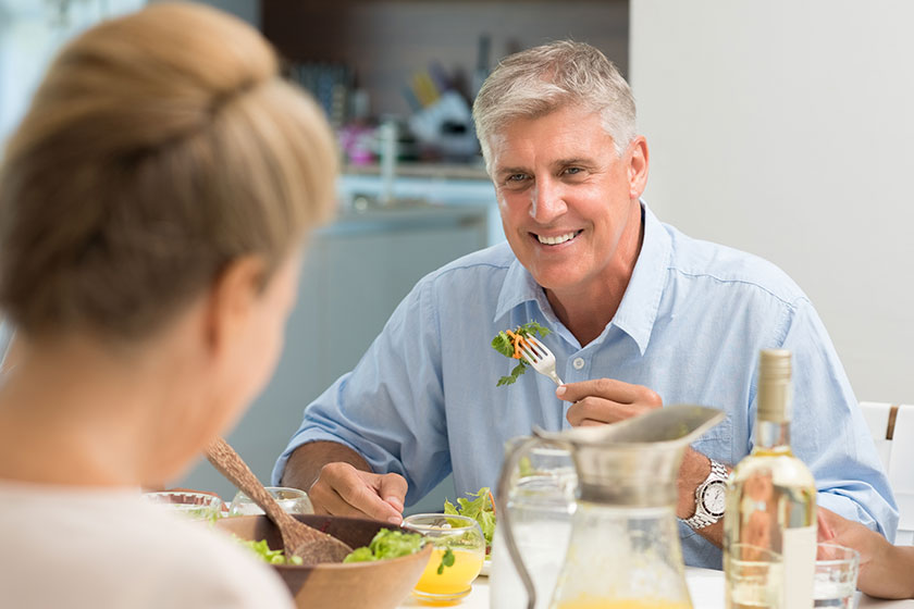 Senior man eating food Senior man eating food