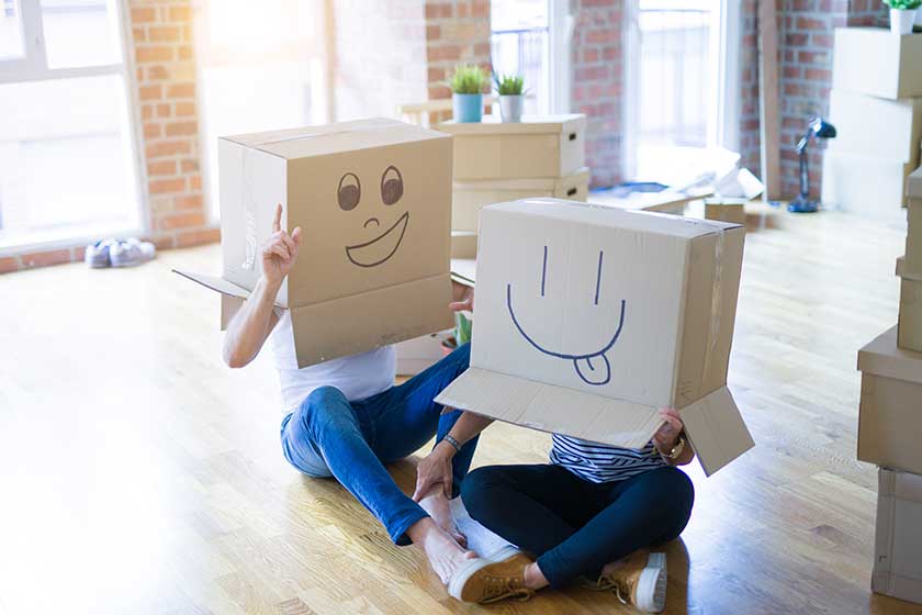 Middle age senior couple moving to a new house Middle age senior couple moving to a new house