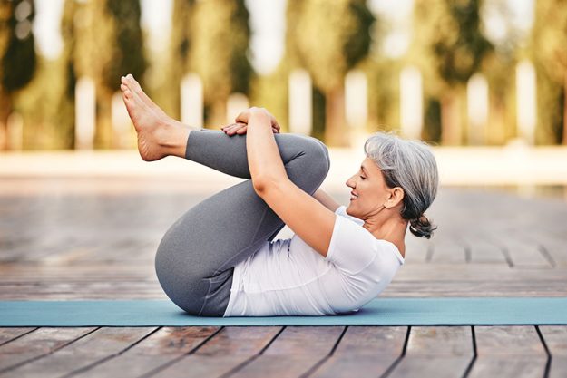 Side view of mature woman in sports wear