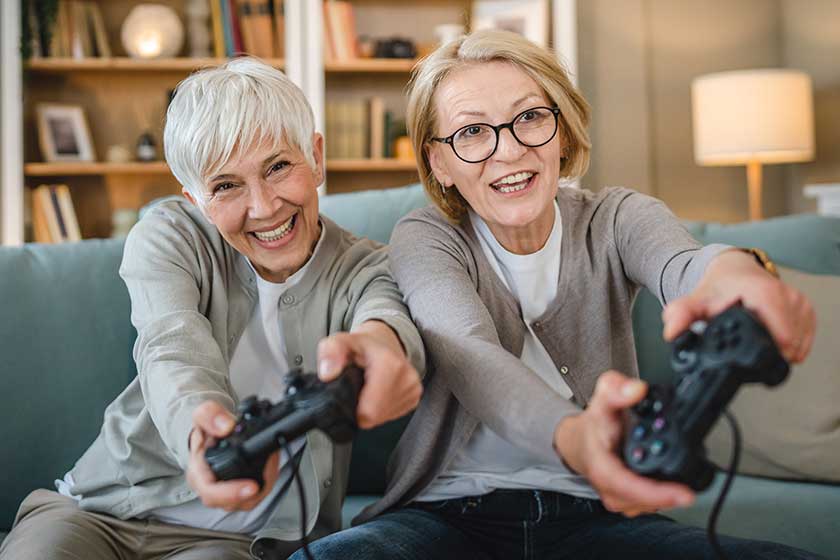 Two senior women Playing Game