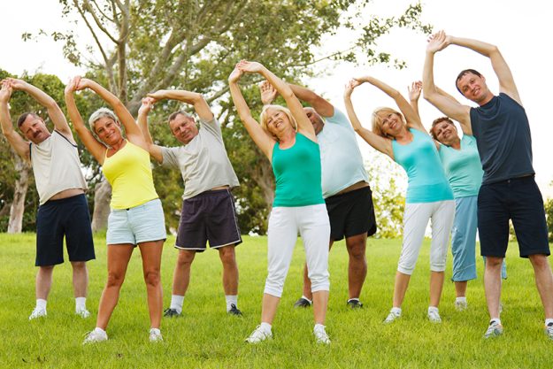 People doing flexibility exercises