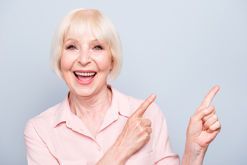 Portrait of old blonde glad lady smiling Portrait of old blonde glad lady smiling