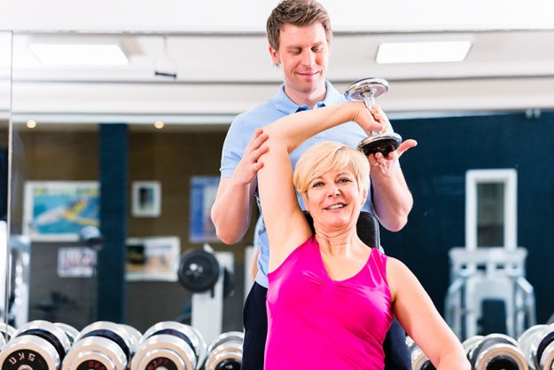 Senior woman at sport exercise in gym Senior woman at sport exercise in gym