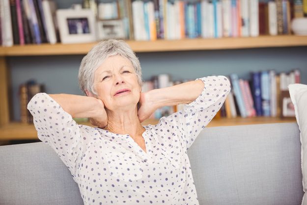 Senior woman suffering from neck pain Senior woman suffering from neck pain