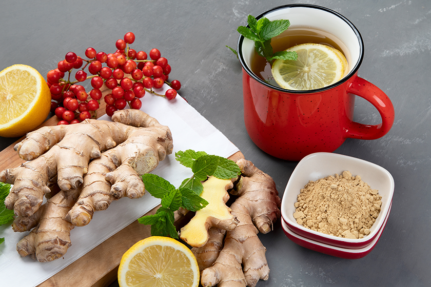 Ginger root with healthy tea with and lemon
