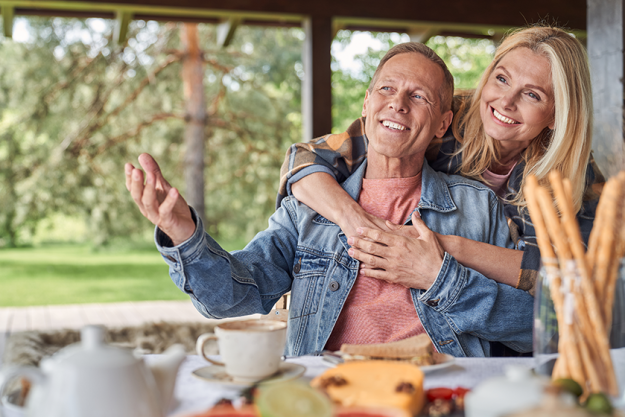 Joyful woman embracing husband
