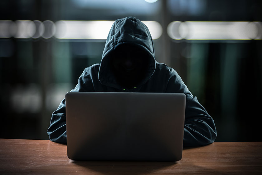 Hacker in front of his computer Hacker in front of his computer