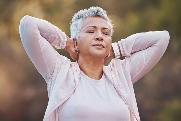 Senior woman, neck pain and tired for outdoor exercise Senior woman, neck pain and tired for outdoor exercise