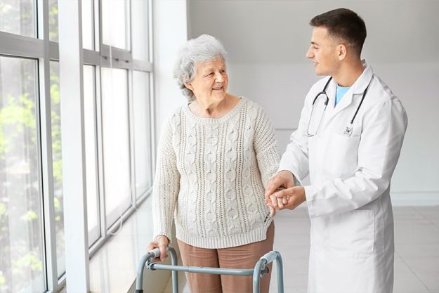 Senior woman with doctor in hospital Senior woman with doctor in hospital
