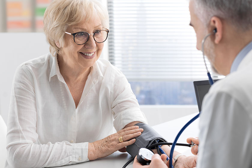 Professional doctor measuring a patient's blood pressure