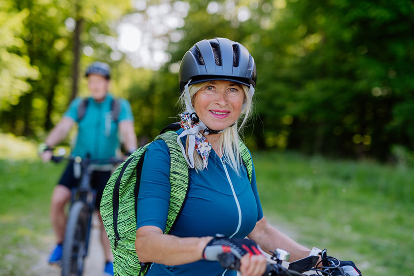 Portrait of an active senior couple riding bicycles