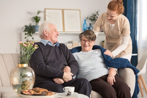 Senior couple and tender caregiver Senior couple and tender caregiver