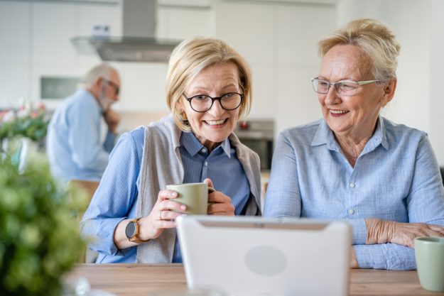 senior mature women family or friends use digital tablet video c senior mature women family or friends use digital tablet video c