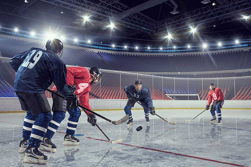 Hockey match at rink . Mixed media Hockey match at rink . Mixed media