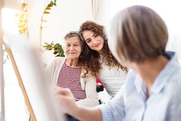 A teenage girl with mother and grandmother at home. A teenage girl with mother and grandmother at home.