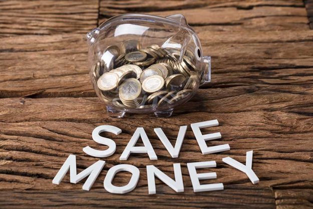 Coins In Glass Piggybank Coins In Glass Piggybank