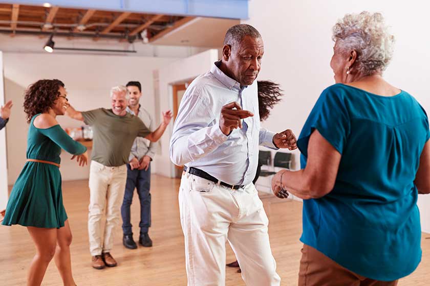 People Attending Dance Class In Community Center
