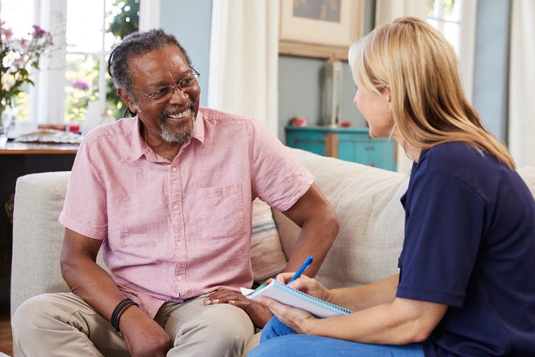 Support Worker Visits Senior Man Support Worker Visits Senior Man