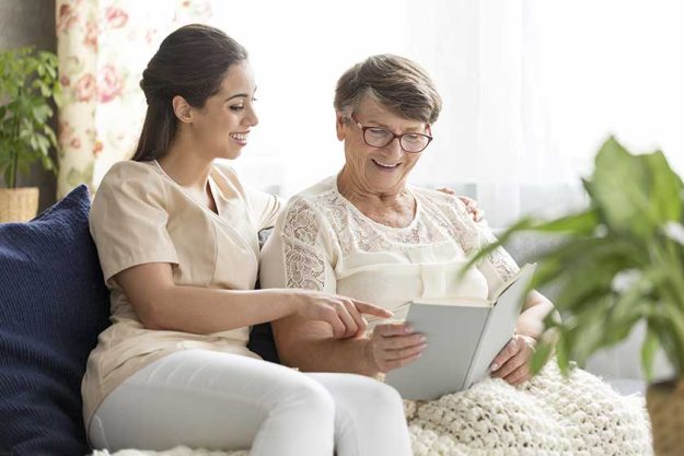 Granddaughter-and-happy-senior-woman Granddaughter-and-happy-senior-woman