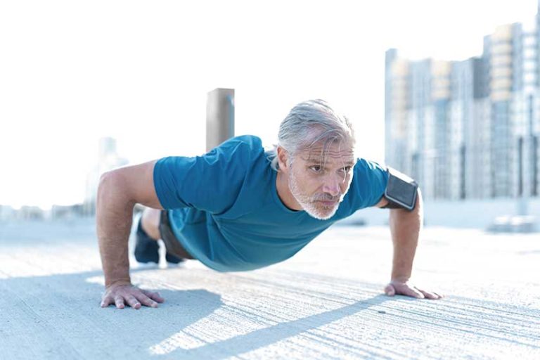 Middle-aged-athletic-man-doing-push-ups-outdoors-fitness-and-exercising-outdoors-urban-environment Middle-aged-athletic-man-doing-push-ups-outdoors-fitness-and-exercising-outdoors-urban-environment
