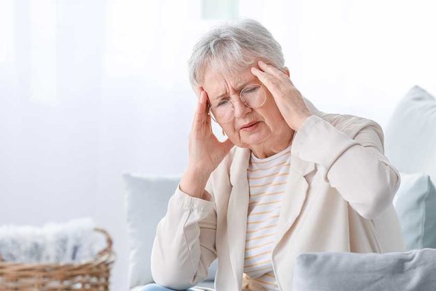 Senior-woman-suffering-from-headache-at-home Senior-woman-suffering-from-headache-at-home