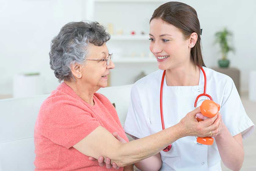 Senior-woman-with-hand-weights Senior-woman-with-hand-weights